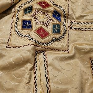 Indian design embroidered coverlet, beige with primary colors